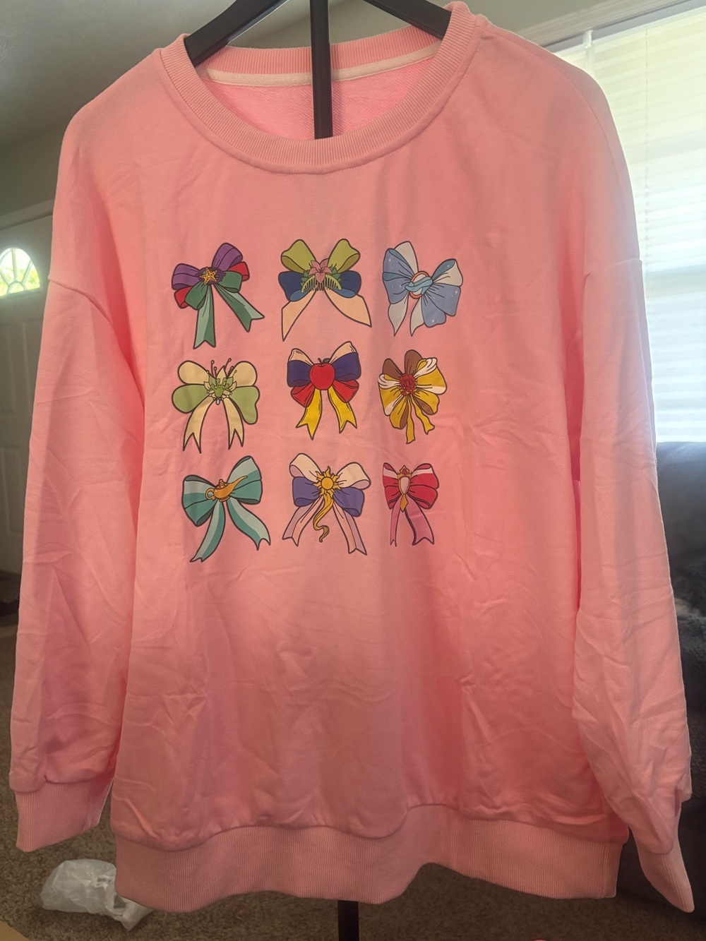 Woman’s Pink Disney Princess Bow Graphic Long-Sleeve Top